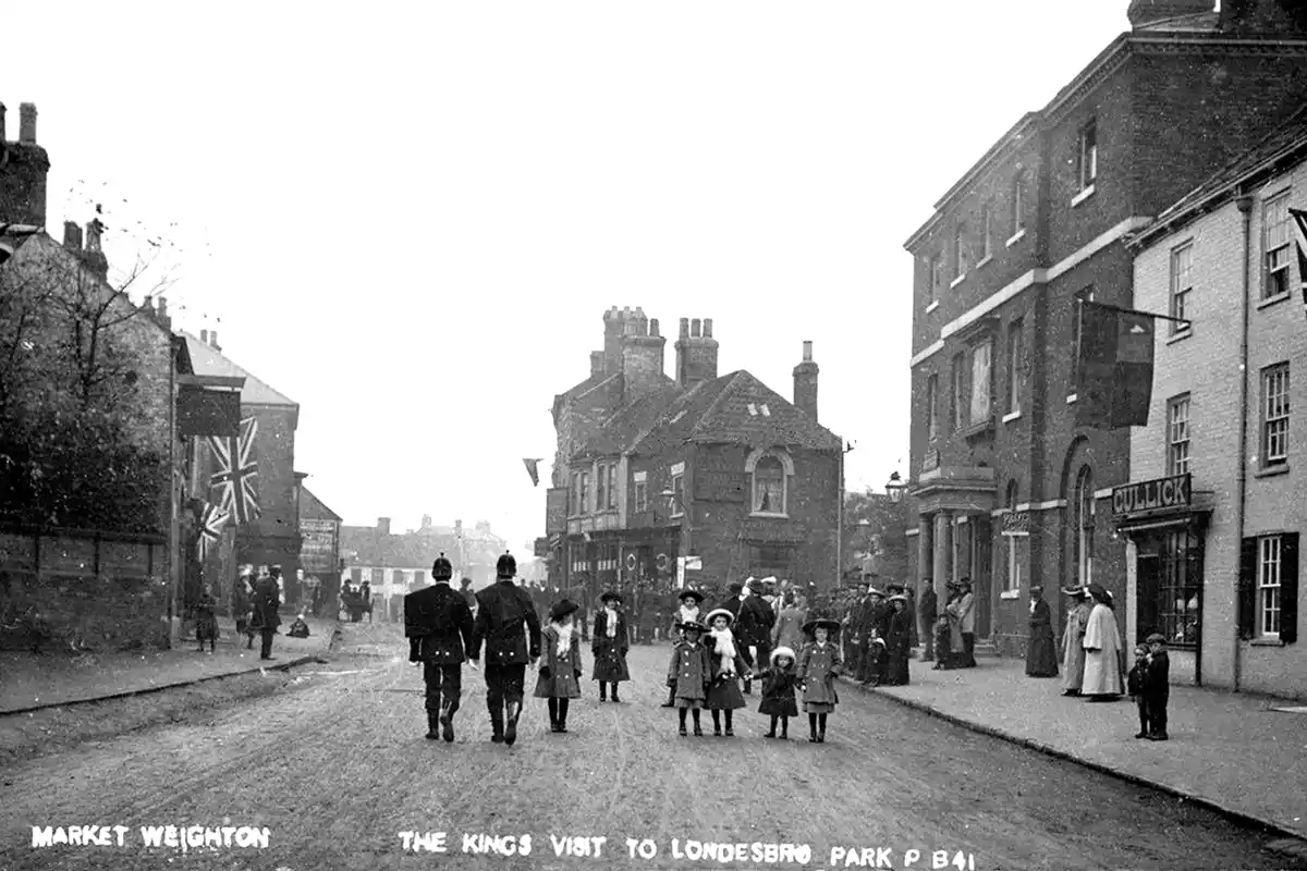 A street view of Market Weighton during the Coronation of George V C1900.